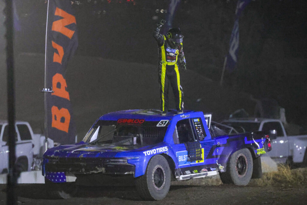 PRO2 truck taking the checkered flag at the 2026 Glen Helen Champ Off-Road finale