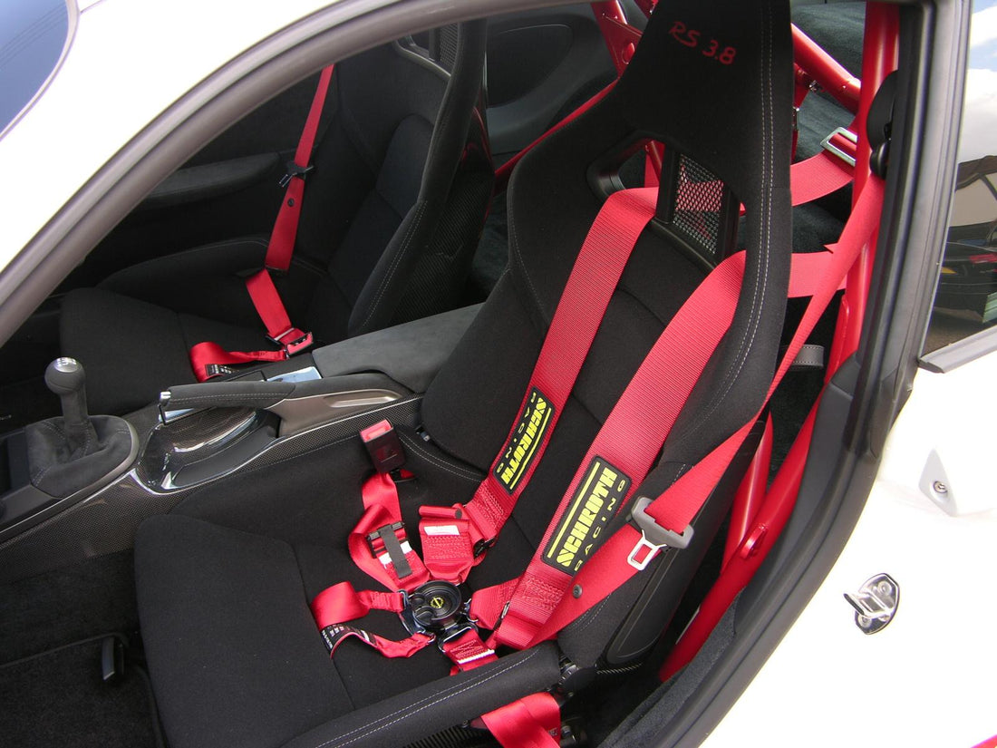 Racing bucket seat with six-point harness