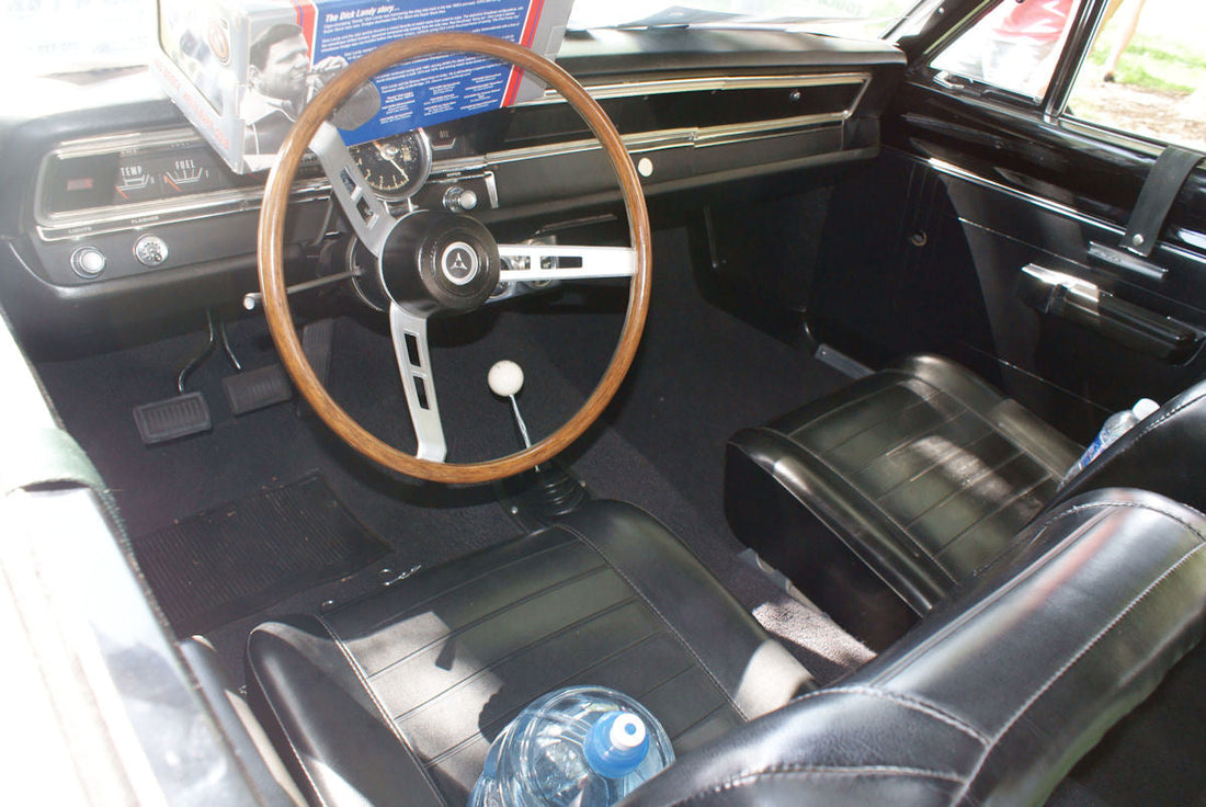 Cockpit of a 1968 Dick Landy racing Dodge Dart; representative race-car cockpit image, not an example of current SCCA master-switch compliance. Photo by Valder137 / Wikimedia Commons, CC BY 2.0.