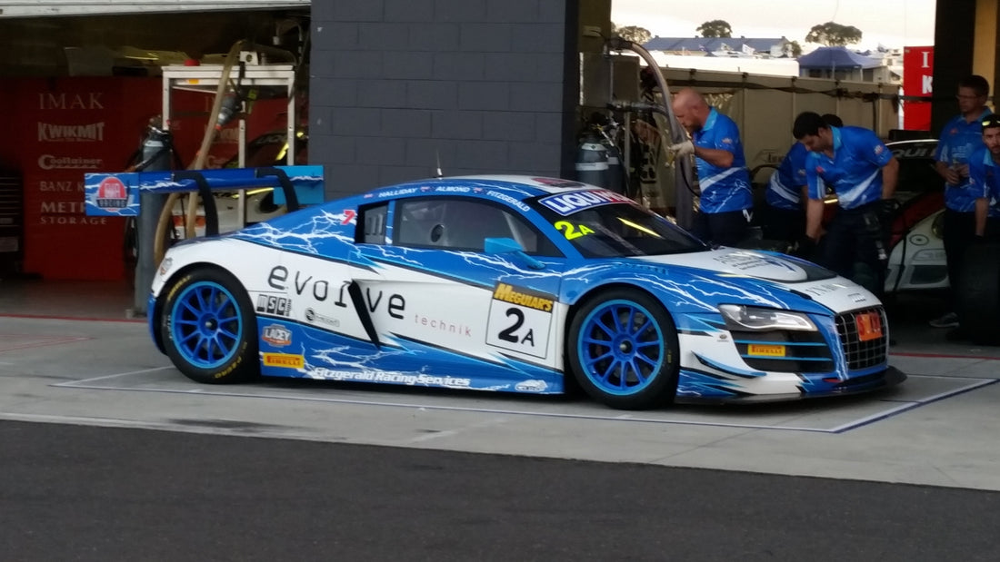 Archive photograph of an Audi R8 LMS Ultra during pit stop practice for the 2015 Bathurst 12 Hour; representative endurance-racing image, not the 2026 IMSA Indianapolis event. Photo by Jason Goulding / Wikimedia Commons, CC BY 2.0.