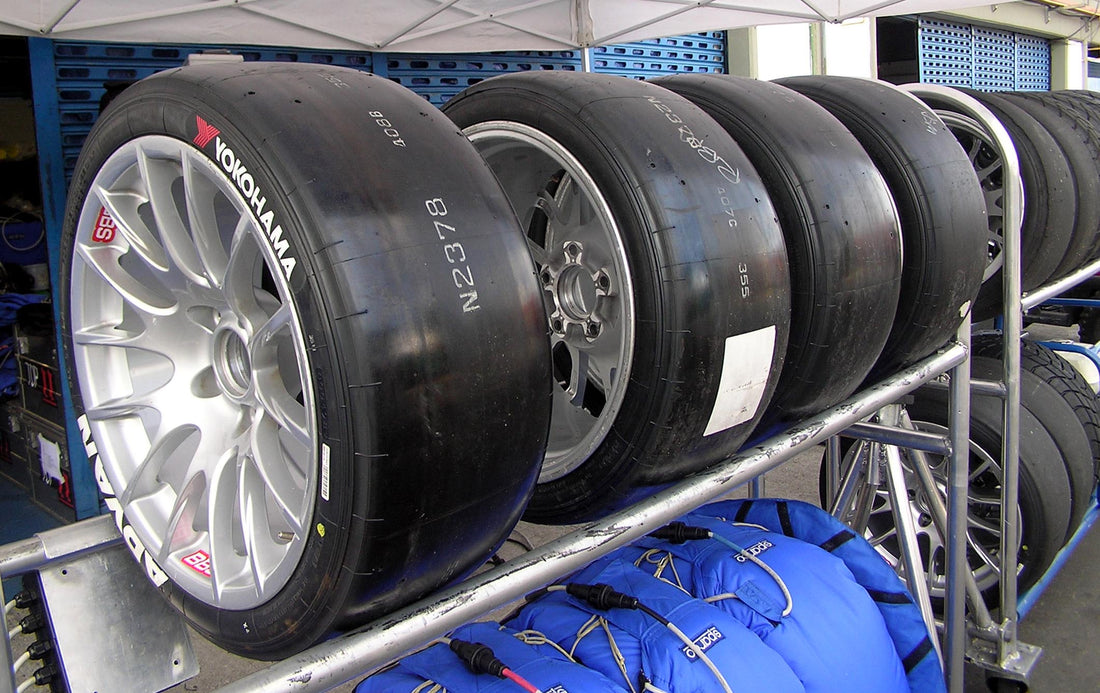Archive 2006 WTCC Yokohama ADVAN slick tires in the paddock at Curitiba; representative road-racing tire image, not a 2026 Race Club event. Photo by Morio, CC BY-SA 3.0.