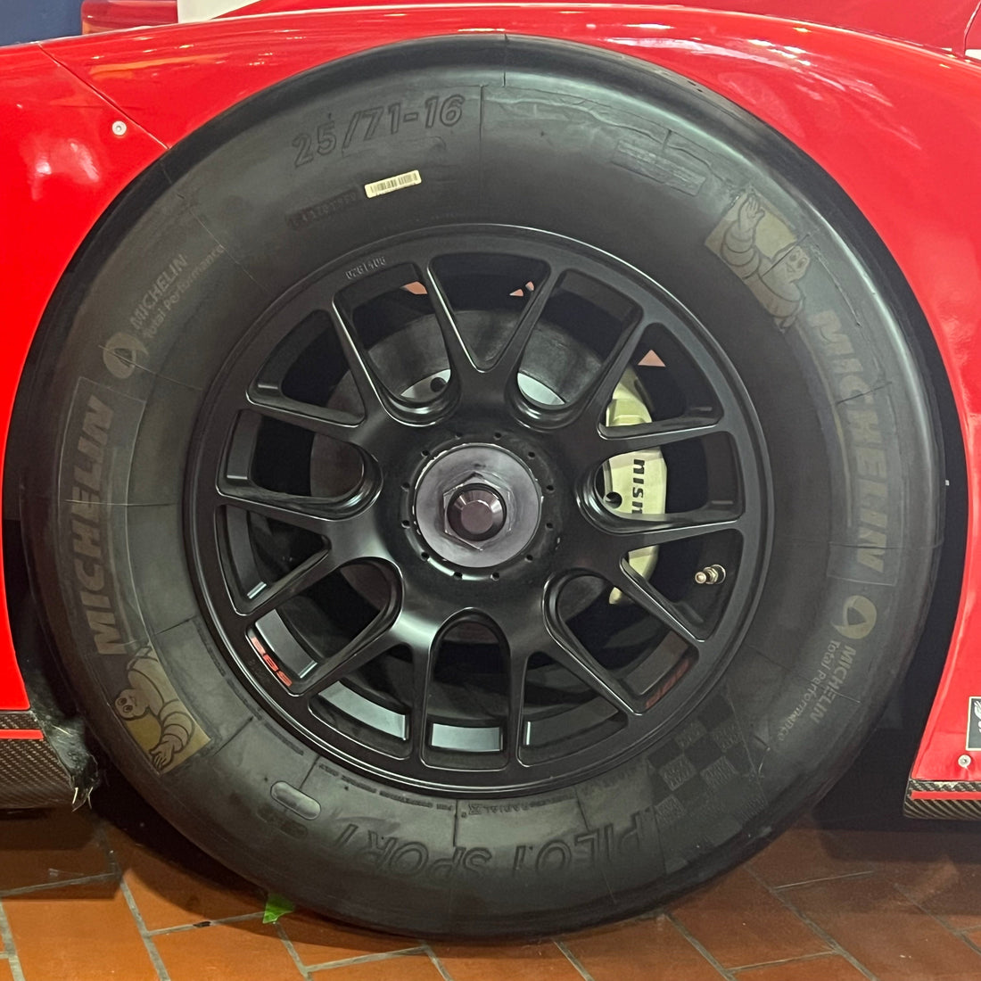 Archive representative Michelin racing tire from a Le Mans car; used to illustrate why treadwear numbers alone do not define competition performance. Photo by TaurusEmerald, Wikimedia Commons.