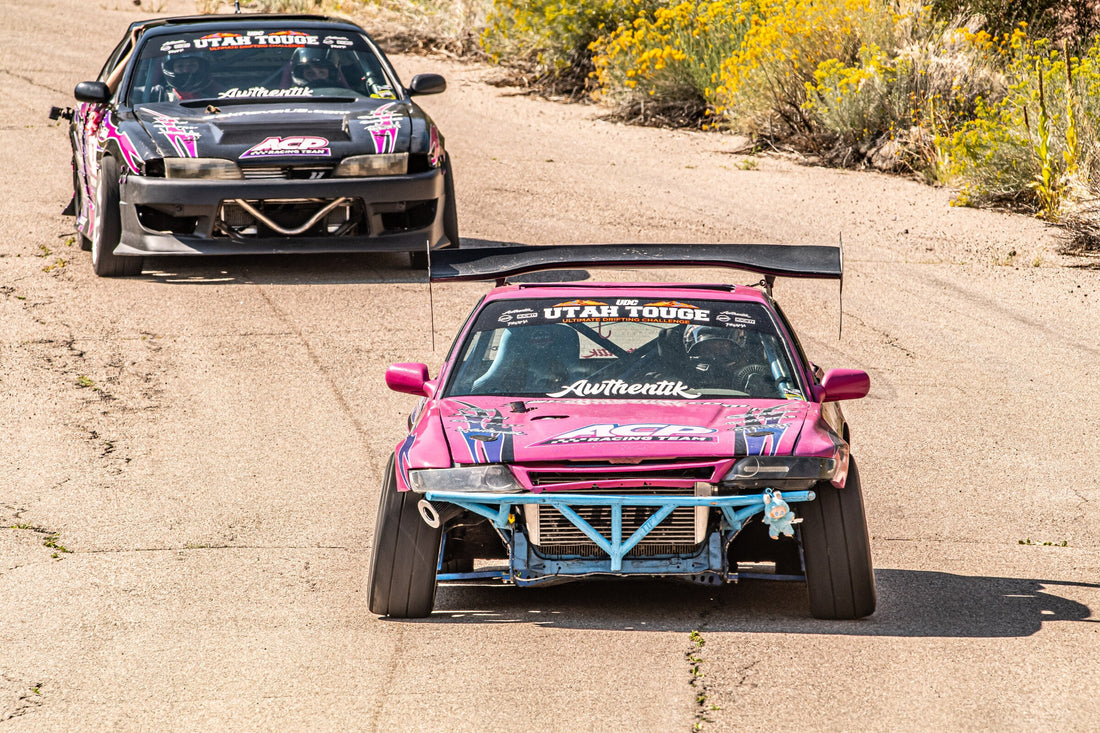 Two Ultimate Drifting Challenge cars running the Utah Touge course