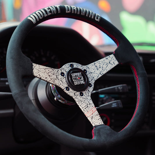 NRG Reinforced Steering Wheel (340mm/1.8in. Deep) HARDCORE x PRISMA Collab.