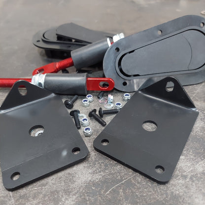 Two Race Club E46 hood pin brackets and mounting hardware with optional AeroCatch latches shown
