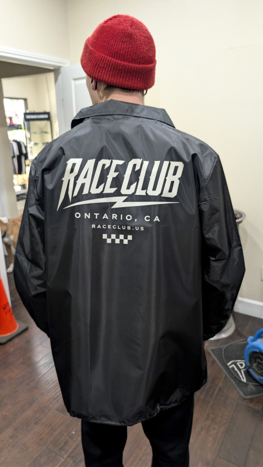 Race Club coach jacket worn in real life, viewed from the back