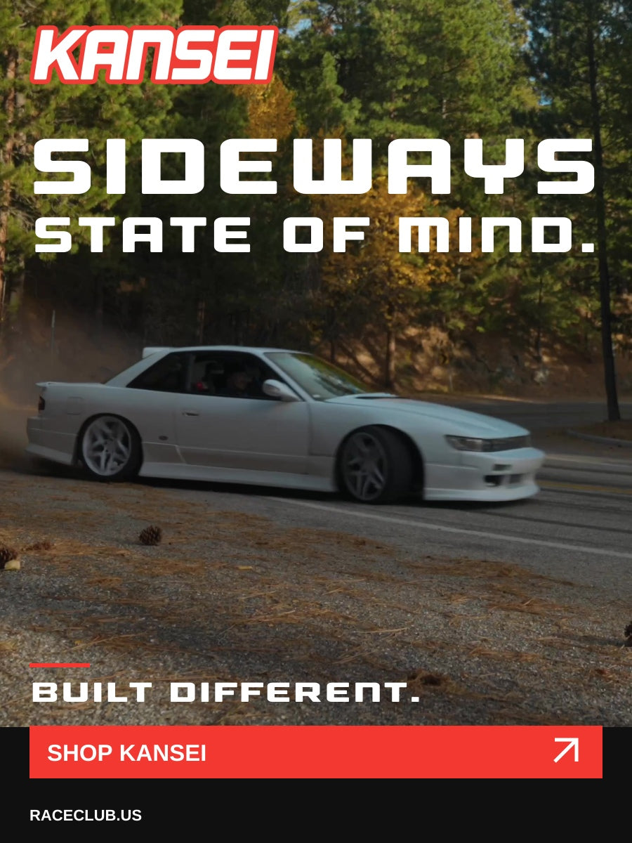 Kansei wheels. White modified car in motion. Sideways state of mind.