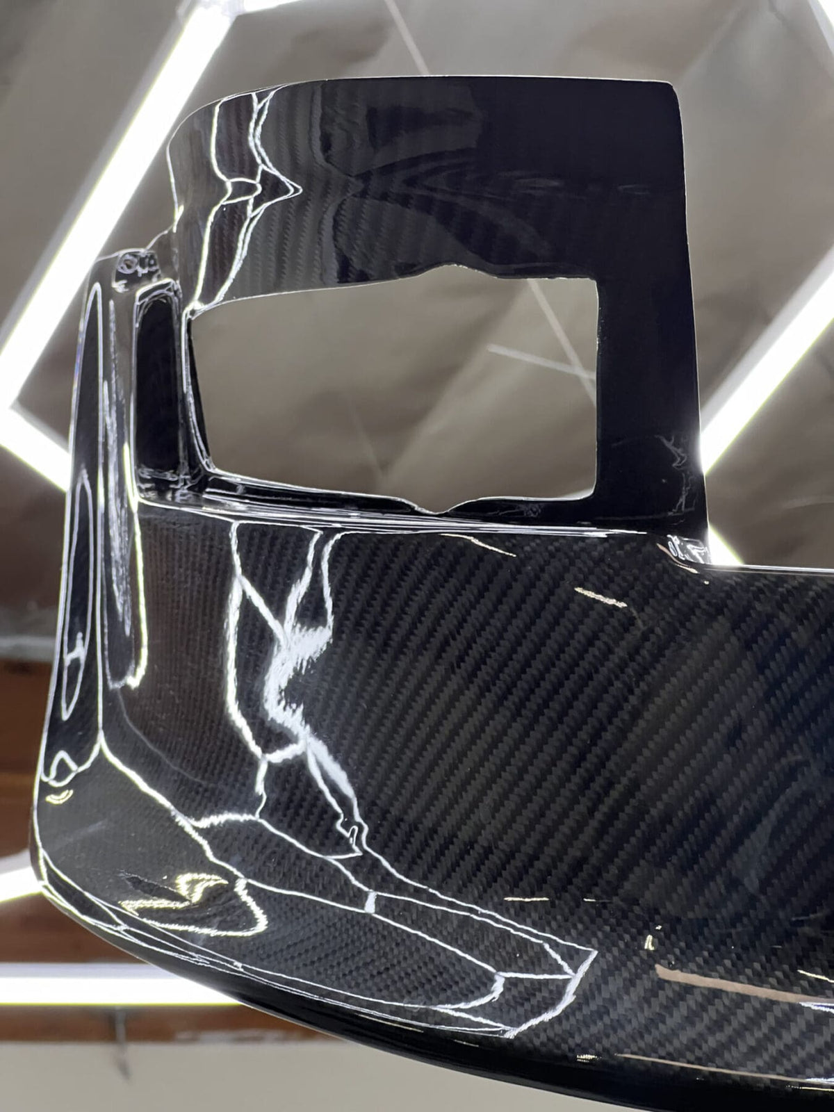 Vintage Carbon S30 GT air dam in gloss carbon fiber, close-up showing the turn-signal opening